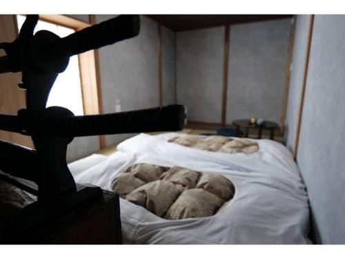 a bed in a room with two mattresses on it at YAKATA - Vacation STAY 58660v in Yuzawa