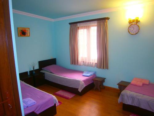Postel nebo postele na pokoji v ubytování Aygestan Comfort Holiday Home