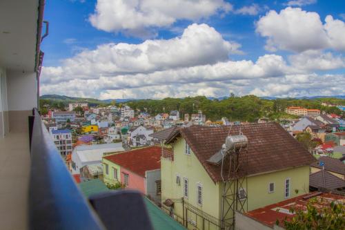 a view of a city from a building at Ha Khoa Hotel Dalat in Da Lat