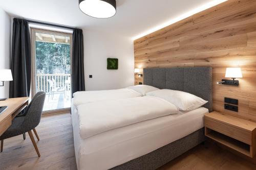 Letto o letti in una camera di Salzkammergut Lodge