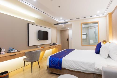 TV a/nebo společenská místnost v ubytování Sunshine Apartment Hotel