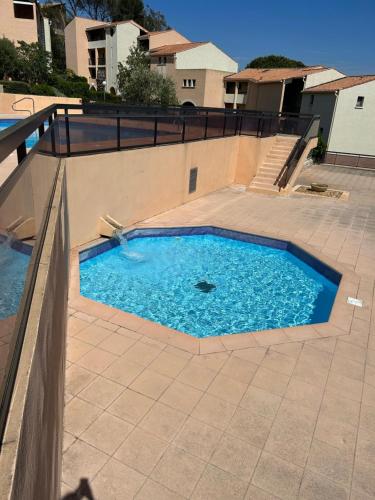 Photo de la galerie de l'établissement appartement 3 piscines accès direct plage, à Roquebrune-sur Argens