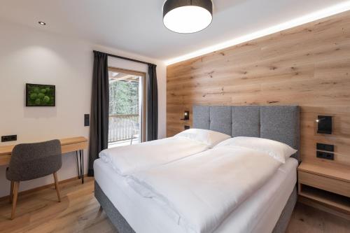 Letto o letti in una camera di Salzkammergut Lodge
