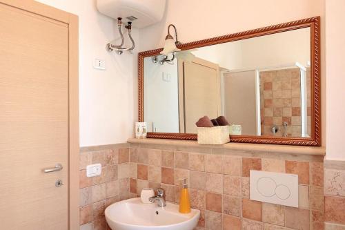 Kylpyhuone majoituspaikassa Comodo appartamento a Lizzano con Vista