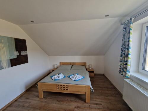 Postel nebo postele na pokoji v ubytování Apartmán Art