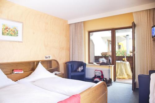 Un pat sau paturi într-o cameră la Bio-Hotel Upländer Hof