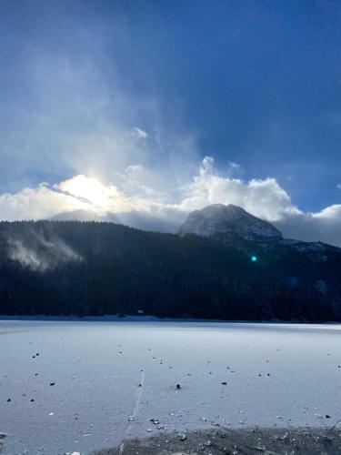 a view of a lake with a mountain in the background at Guesthouse Andrea A in Žabljak