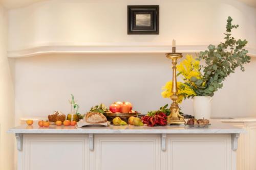 a counter with fruits and vegetables on it at Portella Palma in Palma de Mallorca