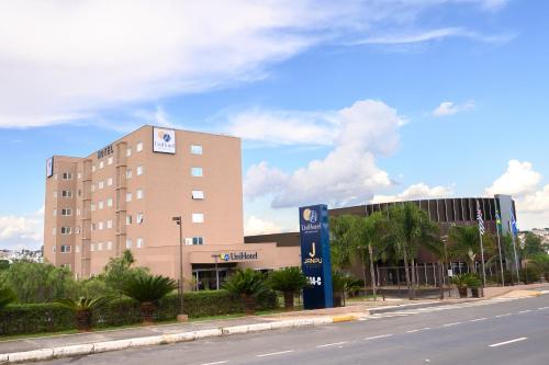 a large building on the side of a street at UniHotel Salto in Salto