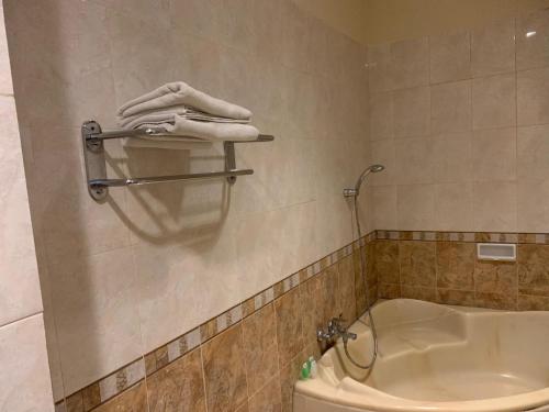 Ванная комната в ENHAII HOTEL