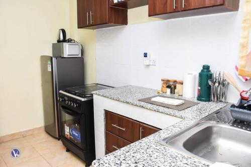 Una cocina o cocineta en Beebalm Homes-Kapsoya, Eldoret