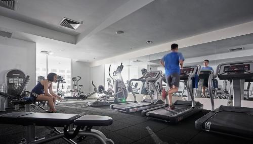 a group of people exercising in a gym at St Giles Wembley Penang in George Town