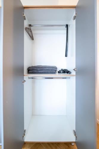 a closet with a white door and a shelf at WOW studios for rent - bul Montevideo 25A - B in Sofia