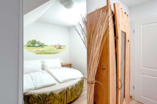 Postel nebo postele na pokoji v ubytování Ferienwohnung Heuschober