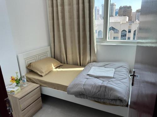 Кровать или кровати в номере Corniche Street - Stunning Room