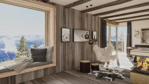 a living room with a fireplace and a large window at Ski-in/Ski-Out Chalet Hauser Kaibling in Gumpenberg
