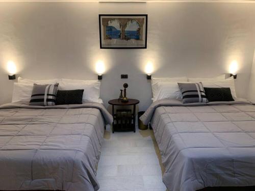 Postel nebo postele na pokoji v ubytování Paradores Filipinas