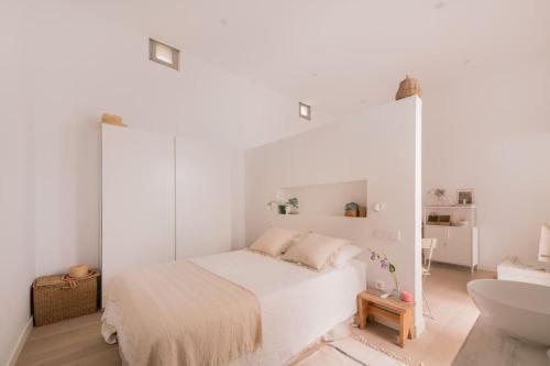 Tempat tidur dalam kamar di Dream flat. New Brooklyn Madrid