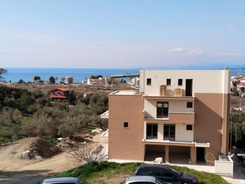 a house with a view of the ocean at Theasis 2 in Neos Marmaras