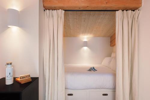 Ein Bett oder Betten in einem Zimmer der Unterkunft LOU CALEN
