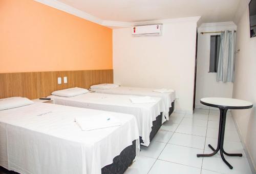 Ένα ή περισσότερα κρεβάτια σε δωμάτιο στο Trip Hotel Lauro de Freitas