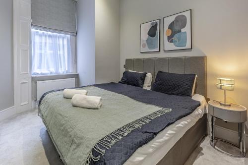 Lova arba lovos apgyvendinimo įstaigoje Green Street Residences by Q Apartments