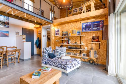 Ruang duduk di Maison Spacieuse avec vue dégagée