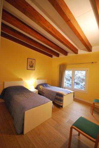 Ένα ή περισσότερα κρεβάτια σε δωμάτιο στο Andrea Olga House