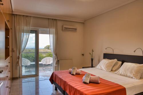 Ένα ή περισσότερα κρεβάτια σε δωμάτιο στο The Masseria