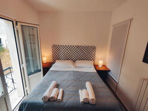 Giường trong phòng chung tại Casetta in Molise, L'Iperico