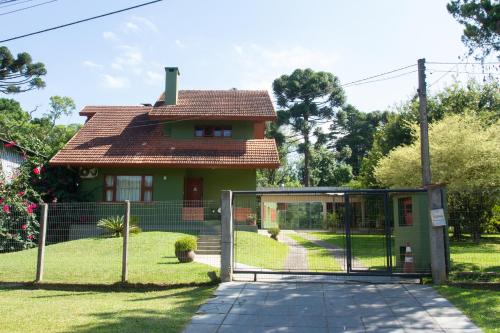 a house with a gate in front of it at Casa Baseggio in Canela