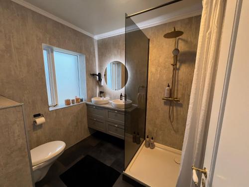 Ванная комната в Garður Apartments