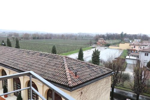 a roof of a building with a view of a river at Borgo Santa Giulia in Corte Franca