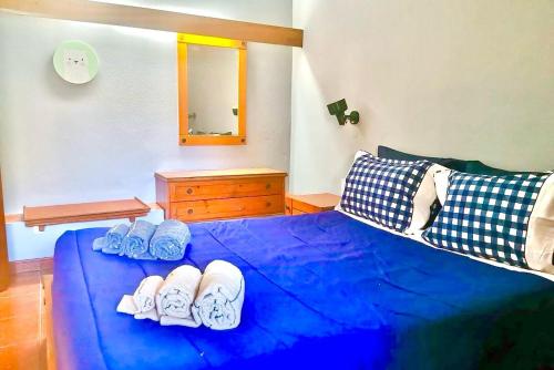 Ένα ή περισσότερα κρεβάτια σε δωμάτιο στο Resort Albufeira T2, Praia da Oura