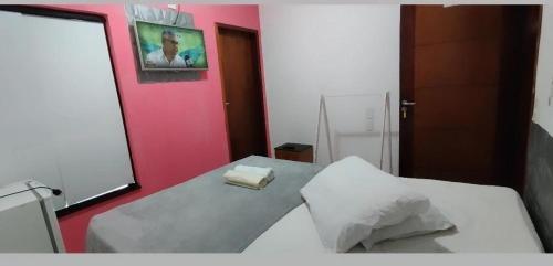 מיטה או מיטות בחדר ב-HOTEL Al ATLANTICO
