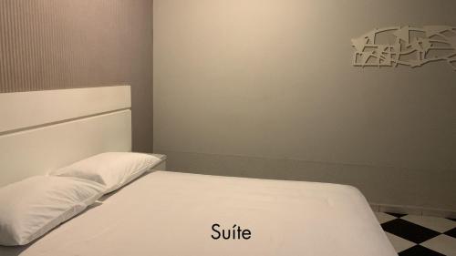 Postel nebo postele na pokoji v ubytování Drops Motel Araraquara