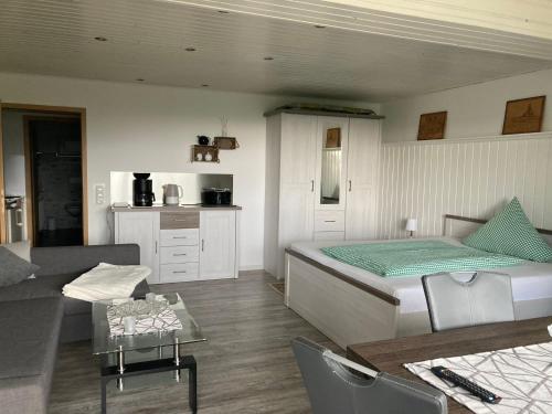 Katil atau katil-katil dalam bilik di Ferienhaus Abtsroda