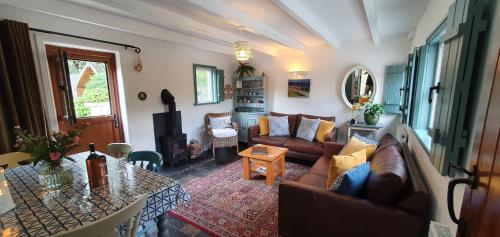 Posezení v ubytování Vale View Cottages -The Coach House