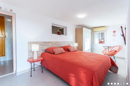 A bed or beds in a room at VH CostaBlanca - AMOR DEL SUR