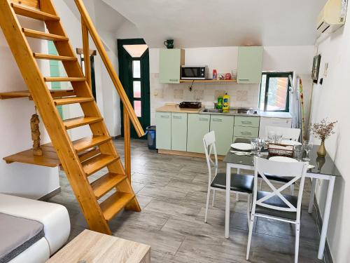 Kuchyňa alebo kuchynka v ubytovaní Apartman Robi
