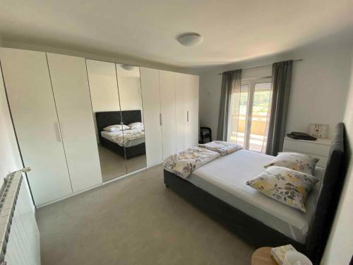 Ένα ή περισσότερα κρεβάτια σε δωμάτιο στο Apartment in Kampor - Insel Rab 49060