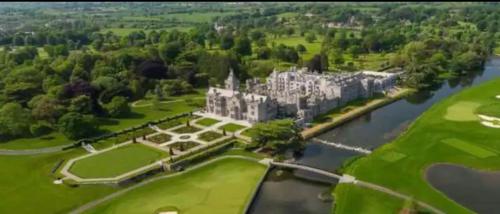 an aerial view of a castle and a river at County Hideaway in Limerick