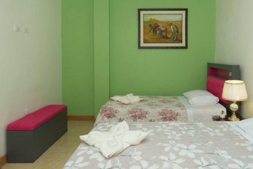 Кровать или кровати в номере K&M Apartment