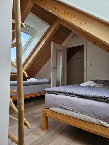 Voodi või voodid majutusasutuse Apartmán MÁJA Mikulov toas