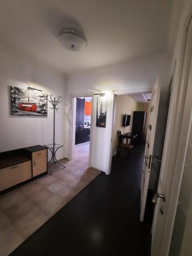 a view of a living room with a hallway at Шикарная 2к квартира Центральный парк Университет 70м in Irpin'