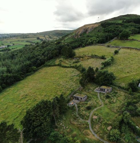 an aerial view of a house on a hill at Panorama Peace Nature in Castlewellan