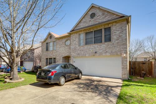a car parked in front of a house at Austin Home with Deck - 9 Mi to Zilker Park! in Austin