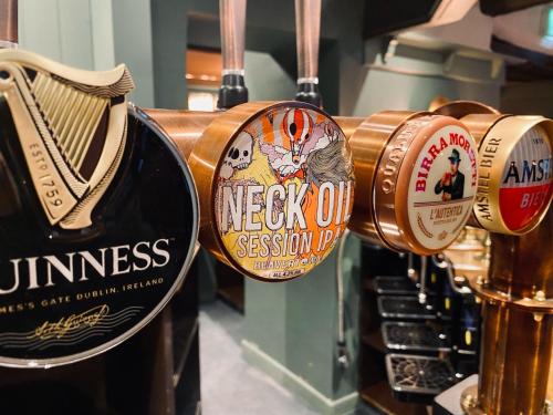 a bunch of different types of bottles of beer at The Ashford Arms in Bakewell