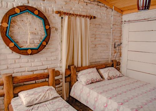 Postel nebo postele na pokoji v ubytování Paradise Camp