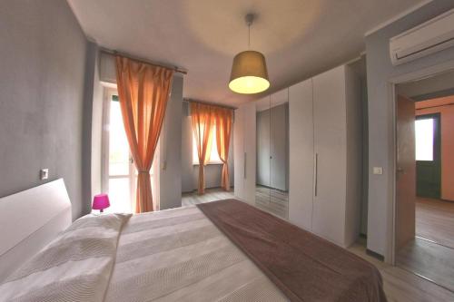Postelja oz. postelje v sobi nastanitve Al Borgo Apartments